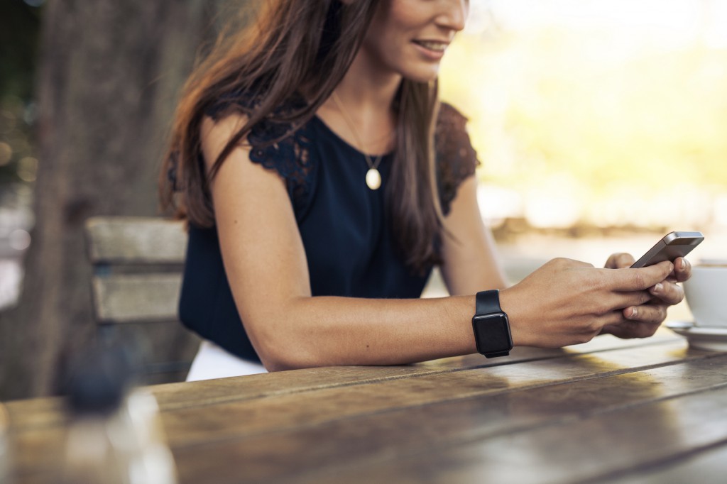 iStock_000074617193_Woman using phone